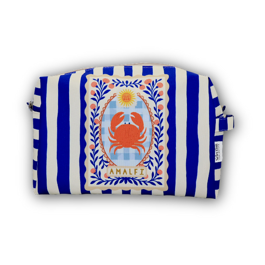 A rectangular zippered pouch with a blue and white vertical stripe pattern, featuring a central decorative crest with an orange crab, a sun, and the word 'AMALEF'.