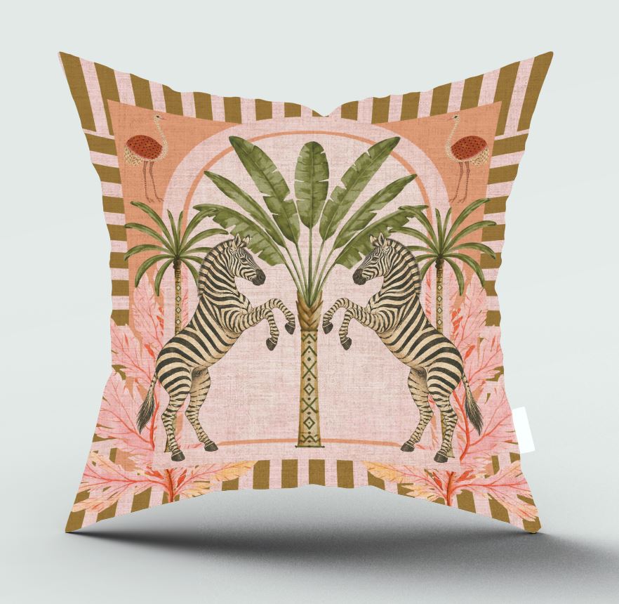 A square decorative throw pillow featuring a retro-style illustration of two zebras facing each other in front of palm trees, with pink tropical leaves and a striped border on a light gray background.