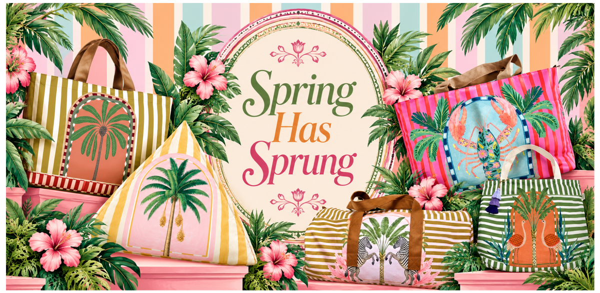 A colorful promotional collage showing multiple patterned tote bags, pillows, and bags with tropical palm tree prints, pink hibiscus flowers, and striped backgrounds. Large text in the center reads 'Spring Has Sprung' in green and pink lettering.