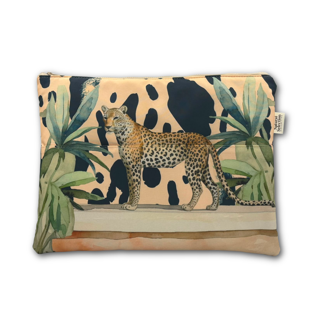 A rectangular zippered pouch featuring a safari-themed print with a leopard, palm leaves, and a spotted background, shown on a plain white background.
