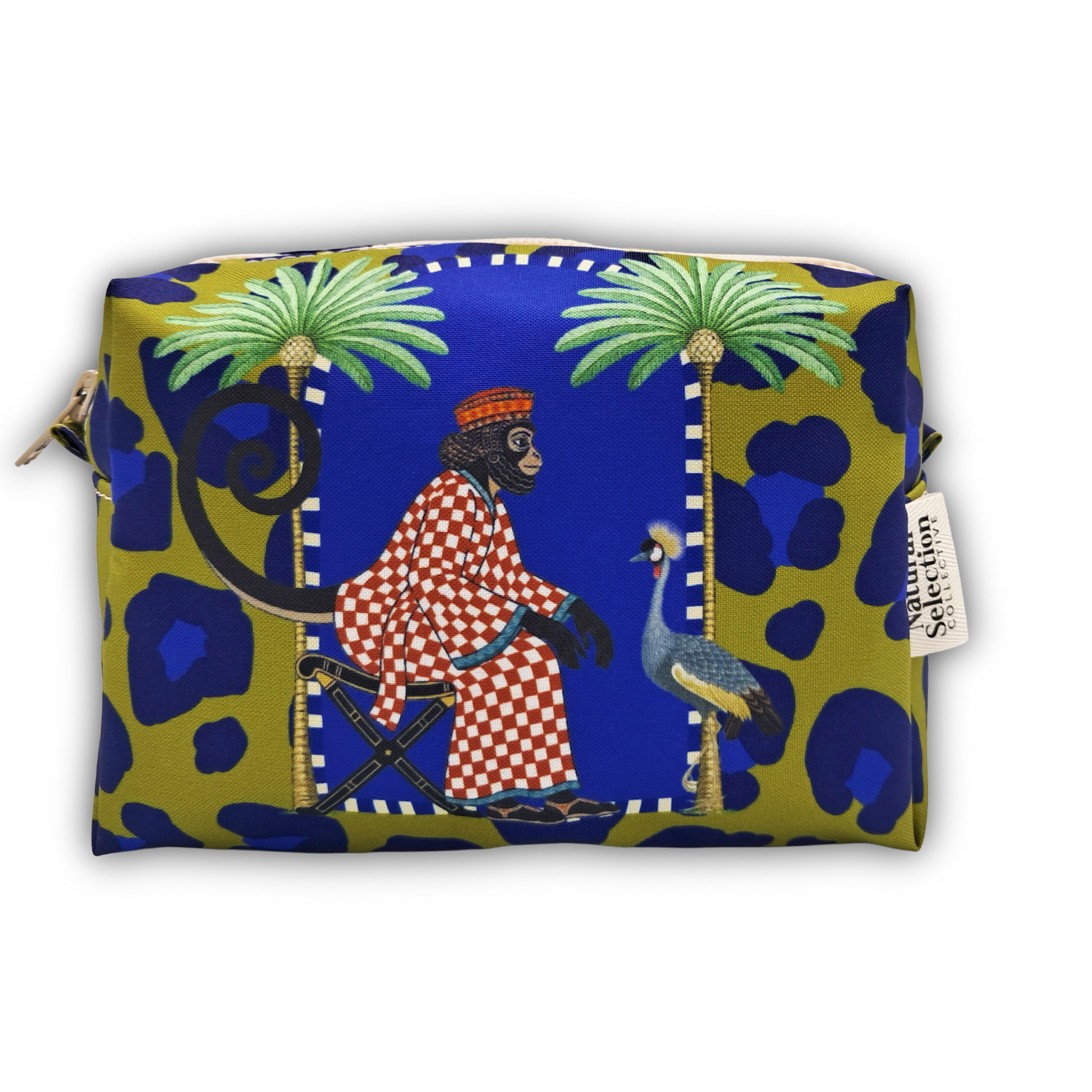 A rectangular zip pouch featuring a vibrant, multicolored print with blue leopard spots, olive green palm trees, and a central illustration of a figure in a red-and-white checkered robe facing a blue bird. A white fabric tag on the right side reads 'Savages Selection'.