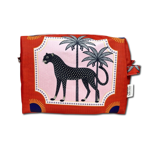 A square fabric pouch with a red-orange border and a central pink panel featuring a black spotted leopard and two palm trees, shown on a plain white background.