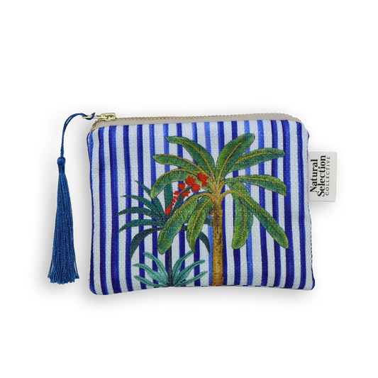 Striped pouch with palm tree design and tassel on a white background