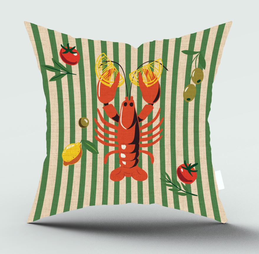 A square decorative throw pillow with a green and beige striped background, featuring a central red lobster holding yellow lemon halves, with tomatoes, olives, and lemon slices illustrated around it.