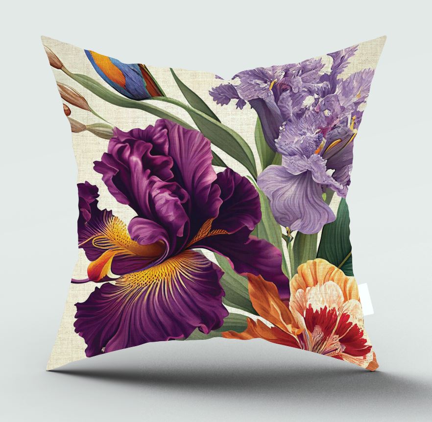 Square decorative throw pillow featuring a vibrant floral print with purple irises, an orange-red tulip, green leaves, and a small blue bird on a light beige linen-textured background, shown against a neutral light gray studio backdrop.