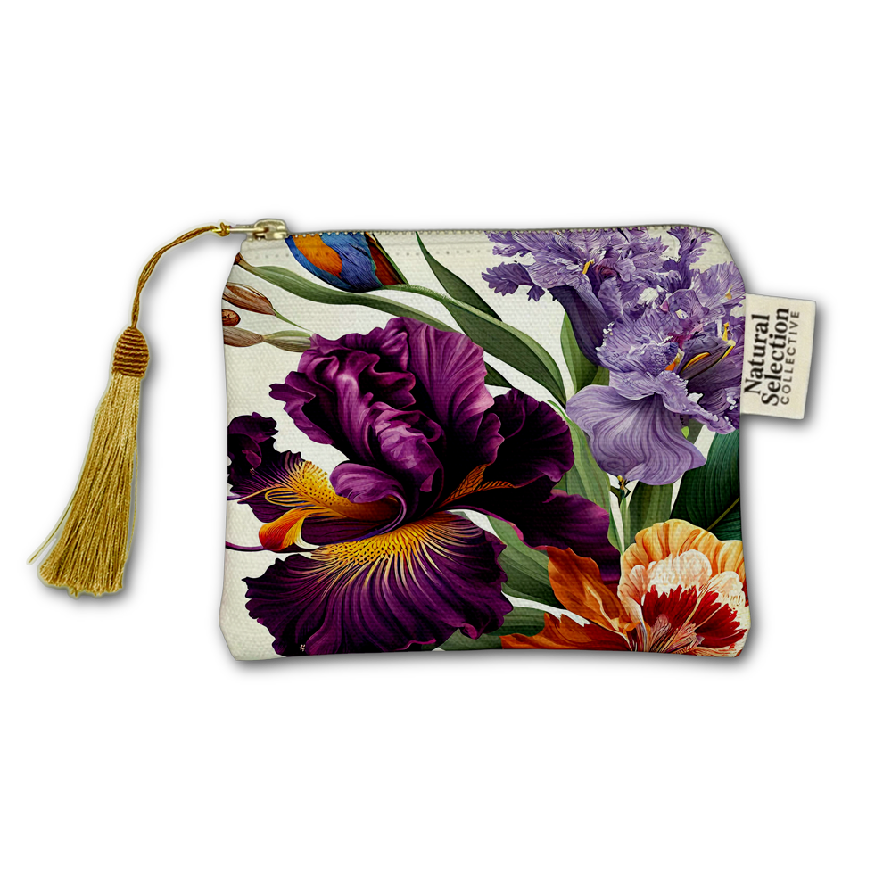 A zippered pouch featuring a vintage-style botanical print of purple irises, green leaves, and a small orange flower on a cream background, complete with a gold tassel zipper pull and a 'Natural Selection Collection' brand tag.
