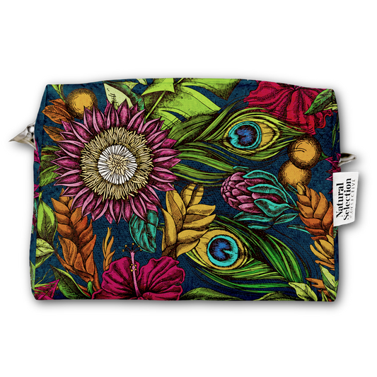 A rectangular zippered pouch featuring a vibrant botanical and peacock feather print on a dark navy background. The print includes pink, purple, green, yellow, and orange floral and leaf motifs.