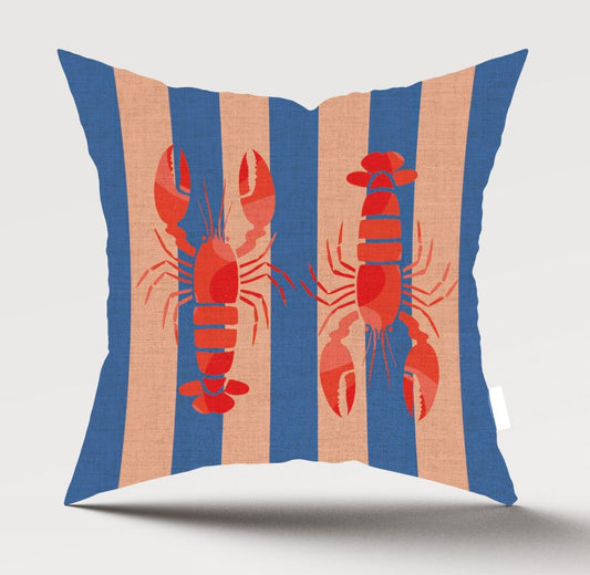 A square throw pillow featuring a pattern of vertical blue and beige stripes with two red lobster illustrations, shown against a light gray background.