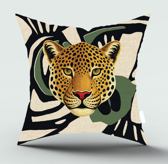Square throw pillow featuring a stylized leopard face illustration over a black, beige, and olive green tropical leaf pattern, shown against a plain white background with a soft shadow.