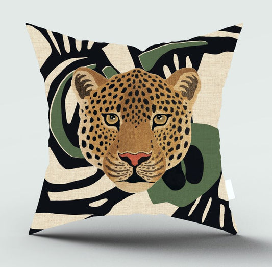 A square throw pillow featuring a stylized leopard face in the center, surrounded by abstract black and olive green shapes on a beige textured background.