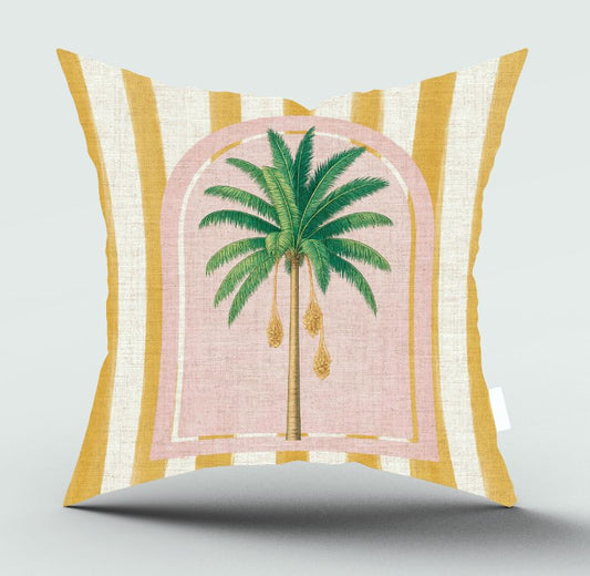 A square decorative throw pillow with a yellow and cream striped border and a central pink arched graphic featuring a green palm tree.