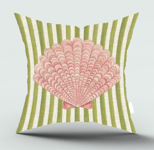 A square throw pillow with a green and cream vertical stripe pattern and a large pink seashell graphic in the center, shown against a light gray background.
