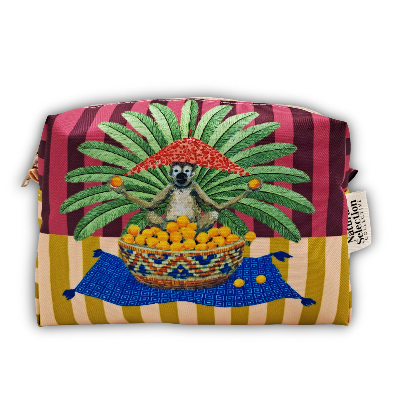 A rectangular zippered pouch with a colorful printed design featuring a lemur under a red mushroom on a green palm tree, set against pink and dark red vertical stripes with a yellow and cream striped bottom section. A white fabric tag on the right side reads 'Senti Selection'.