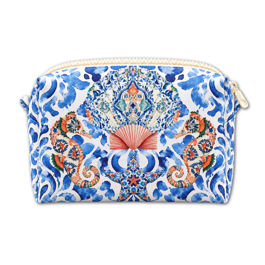 A zippered cosmetic pouch featuring a detailed blue and white tile-inspired pattern with a central coral fan motif and orange floral details, shown on a plain white background.