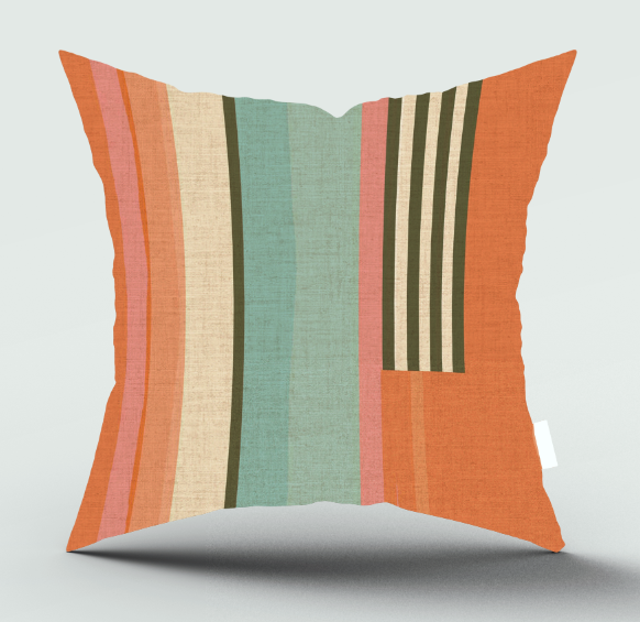A square throw pillow with a colorful striped pattern in orange, teal, pink, beige, and dark green, shown against a light gray background with a soft shadow underneath.