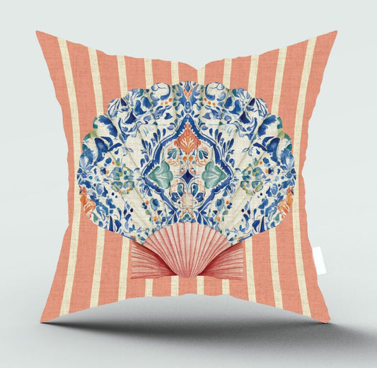 A square decorative throw pillow with a coral pink and cream vertical stripe background, featuring a large central fan-shaped motif in blue, green, and orange floral tile-style print, shown on a light gray background.