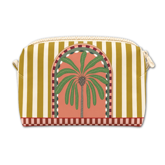 A zippered cosmetic pouch featuring a vertical olive green and cream stripe pattern, with a central illustration of a green palm tree inside a peach arch, and a red-and-cream checkered border at the bottom.