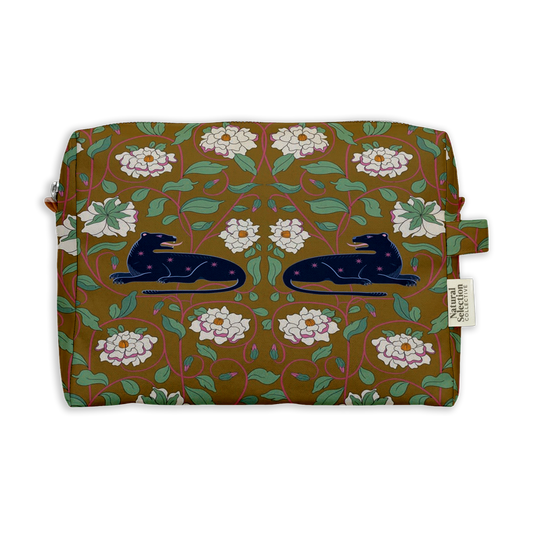 Pavilion Leos Toiletry Bag featuring two navy leopards among white flowers and leaves on ochre brown