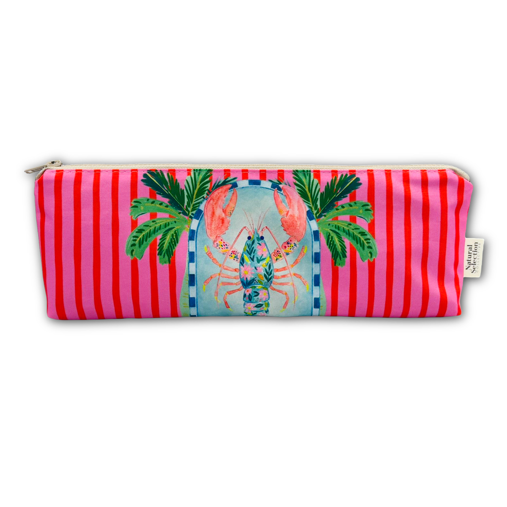 A rectangular zippered pouch featuring a vibrant pink and red vertical stripe pattern, with a central illustration of a lobster under palm trees on a light blue background. A small fabric tag on the right side reads 'Savages Art & Design'.