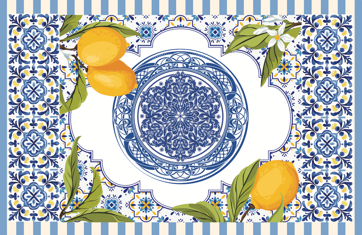 Tuscan Siesta Tablecloth featuring lemons and a blue and white plate on blue tiles